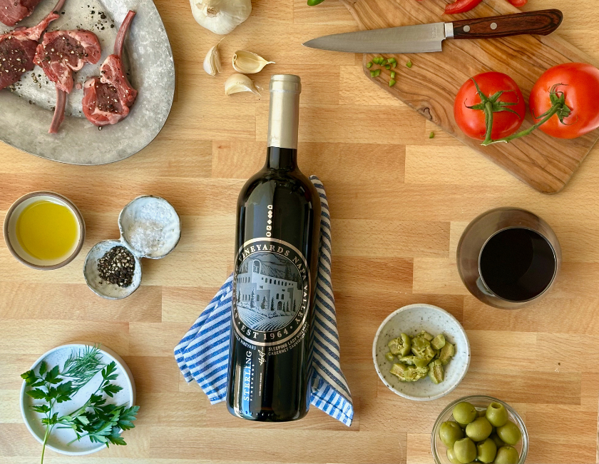 grill lamb lollipops and other ingredients with sleeping lady cabernet