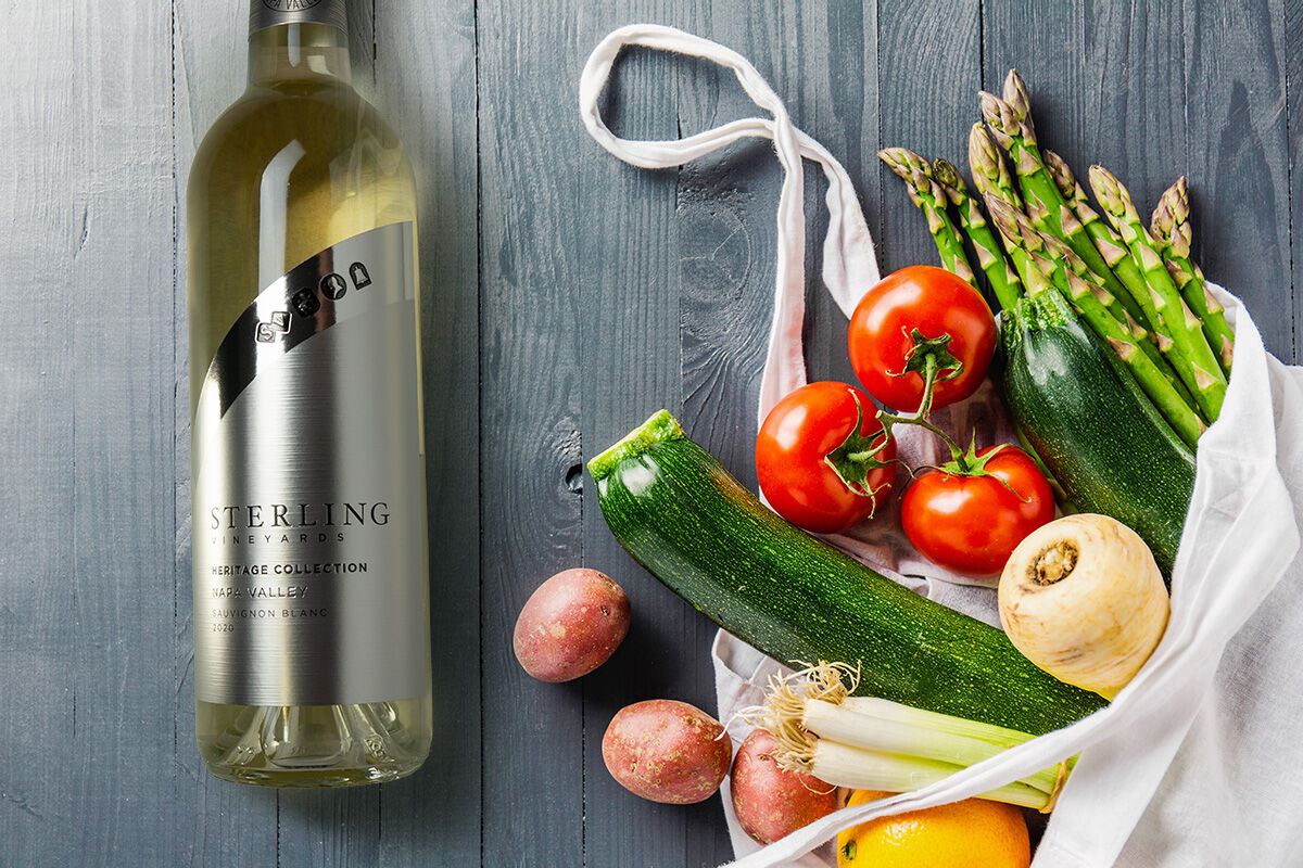 Sauvignon Blanc bottle and farmers market vegetables.