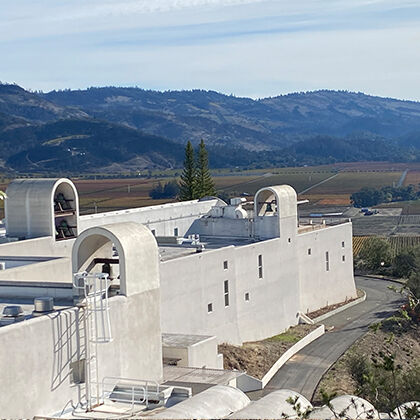Guest Sipping Red Wine on Sterling Terrace Overlooking Napa Valley